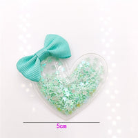 Heart Shaker with Bow